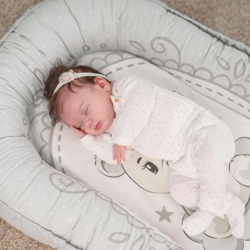 réducteur lit bébé gris